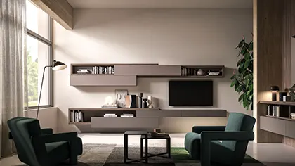 Soggiorno moderno con un televisore e mobili eleganti disposti in modo accogliente.